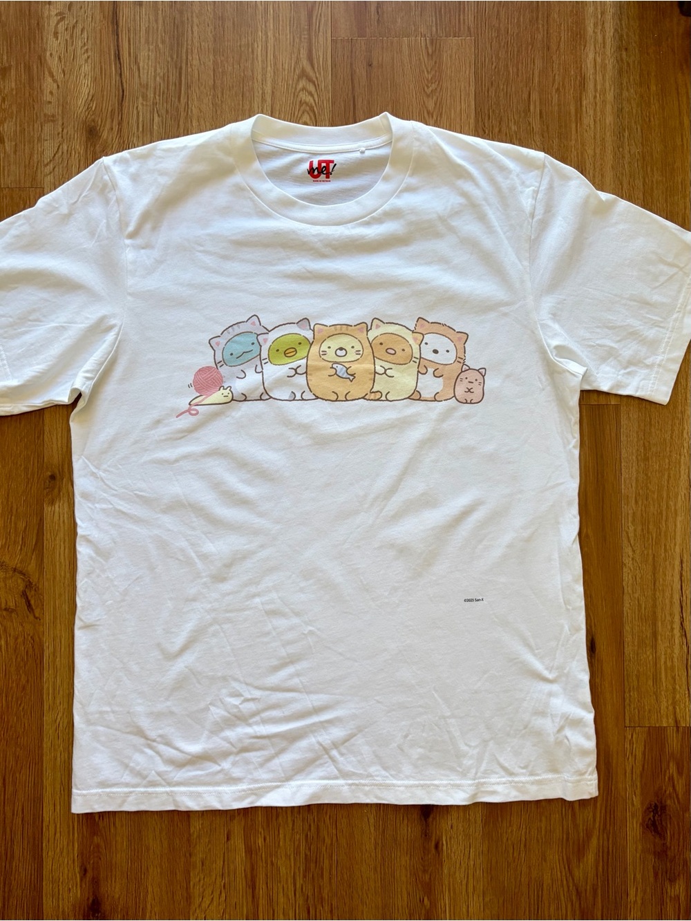 Uniqlo White Graphic Short Sleeve Tee with Pastel Character Print